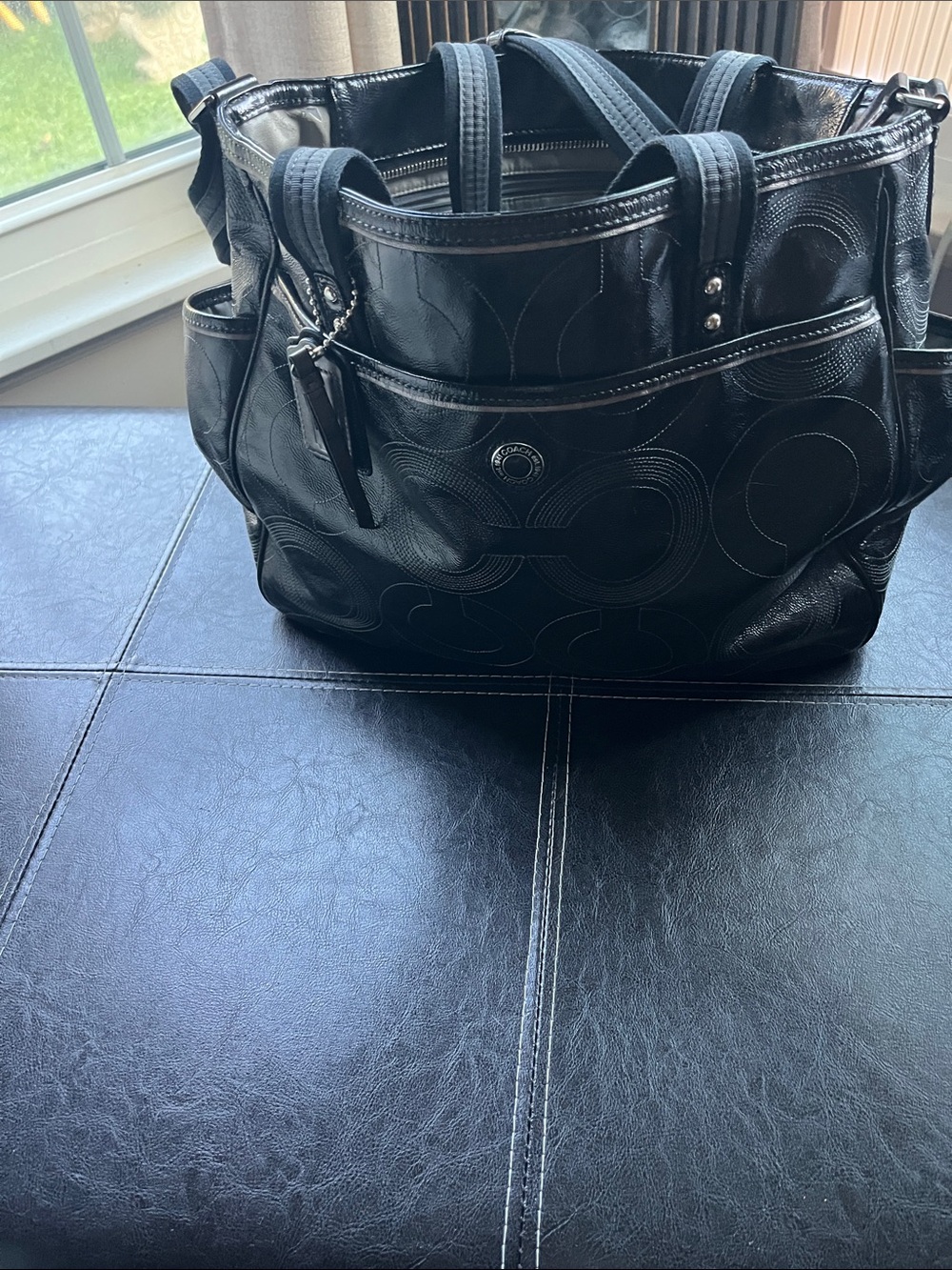 Coach Black Patent Leather Baby Bag with Signature Circular Stitching